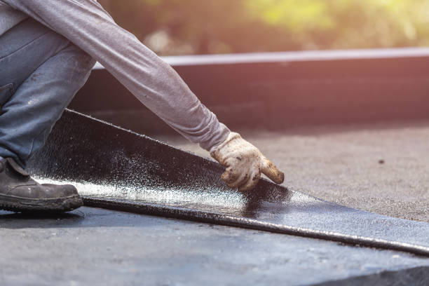 Professional Basement Waterproofing technician working in Pendleton, OR